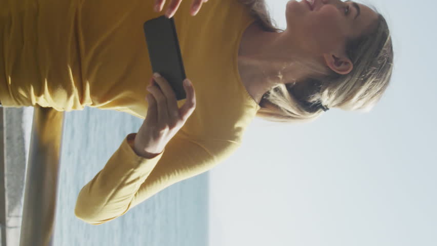 Animation of social media notifications over smiling couple taking selfie on holiday by the sea. social media and global communication interface technology concept digitally generated video. - Powered by Shutterstock - Get 15% off with code: PIKWIZARD15