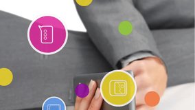 Animation of network of connections with icons over businesswoman using tablet. social media and communication interface concept digitally generated video. - Powered by Shutterstock - Get 15% off with code: PIKWIZARD15