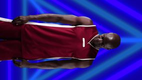 Animation of african american male basketball player with arms crossed over shapes. global sport and digital interface concept digitally generated video. - Powered by Shutterstock - Get 15% off with code: PIKWIZARD15