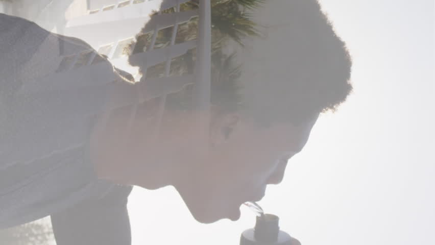 Animation of african amercian man running and drinking water. global sport and fitness concept digitally generated video.