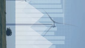Animation of financial data processing over wind turbines in field in countryside. Global environment, business and data processing concept digitally generated video. - Powered by Shutterstock - Get 15% off with code: PIKWIZARD15