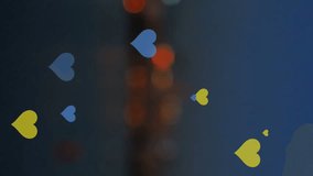 Animation of yellow and blue hearts floating over night cityscape. ukraine crisis and international politics concept digitally generated video. - Powered by Shutterstock - Get 15% off with code: PIKWIZARD15