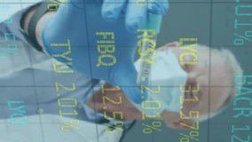 Animation of stock market data processing over caucasian senior male doctor holding covid-19 vaccine. Covid-19 pandemic concept - Powered by Shutterstock - Get 15% off with code: PIKWIZARD15