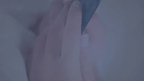 Animation of network of connections with icons over woman using smartphone. Global data processing, networks, connections, finance and business concept digitally generated video. - Powered by Shutterstock - Get 15% off with code: PIKWIZARD15