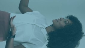 Animation of interface with data processing over african american woman giving a presentation. Computer interface and business technology concept - Powered by Shutterstock - Get 15% off with code: PIKWIZARD15