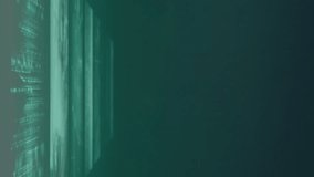 Animation of screens with data processing against green gradient background. Computer interface and business technology concept - Powered by Shutterstock - Get 15% off with code: PIKWIZARD15