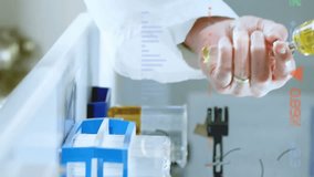 Animation of financial data processing over caucasian male scientist working in lab. Global science, finances and digital interface concept digitally generated video. - Powered by Shutterstock - Get 15% off with code: PIKWIZARD15