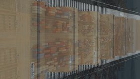 Animation of statistics data processing over cardboard boxes on conveyor belt and shipping port. Global shipping and delivery concept digitally generated video. - Powered by Shutterstock - Get 15% off with code: PIKWIZARD15