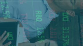 Animation of financial data processing over business people using electronic devices. global finances and business concept digitally generated video. - Powered by Shutterstock - Get 15% off with code: PIKWIZARD15