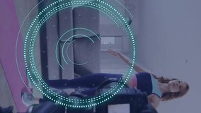 Animation of data processing over caucasian woman exercising, recording fitness vlog. Global online vlogging, fitness, digital interface and connections concept digitally generated video. - Powered by Shutterstock - Get 15% off with code: PIKWIZARD15