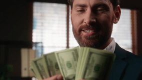 Close up excited happy mature business man counting dollars smiling rejoice with banknotes in office middle-aged businessman male entrepreneur enjoying cash money financial success working job invest - Powered by Shutterstock - Get 15% off with code: PIKWIZARD15