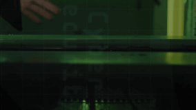 Animation of binary coding data processing with asian male it technician by computer servers. Global computing, digital interface and data processing concept digitally generated video. - Powered by Shutterstock - Get 15% off with code: PIKWIZARD15