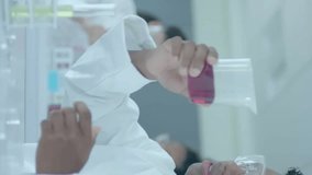 Animation of ai data processing over diverse students in laboratory. Artificial intelligence, education, connections, computing and data processing concept digitally generated video. - Powered by Shutterstock - Get 15% off with code: PIKWIZARD15