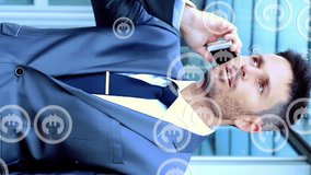 Animation of falling euro sign over businessman using smartphone. Global business, finances, data processing and digital interface concept digitally generated video. - Powered by Shutterstock - Get 15% off with code: PIKWIZARD15