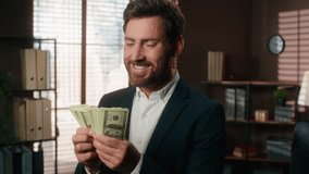 Mature business man counting dollars banknotes in office businessman male professional employer in company enjoying earned kissing cash money smiling happy finances wages salary financial success work - Powered by Shutterstock - Get 15% off with code: PIKWIZARD15