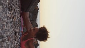 Animation of multiple notification bars over diverse couple doing yoga at beach. Digital composite, multiple exposure, business, love, togetherness, fitness and social media reminder concept. - Powered by Shutterstock - Get 15% off with code: PIKWIZARD15