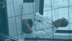 Animation of financial data processing over caucasian businessman in office. Global finance, business, connections, computing and data processing concept digitally generated video. - Powered by Shutterstock - Get 15% off with code: PIKWIZARD15