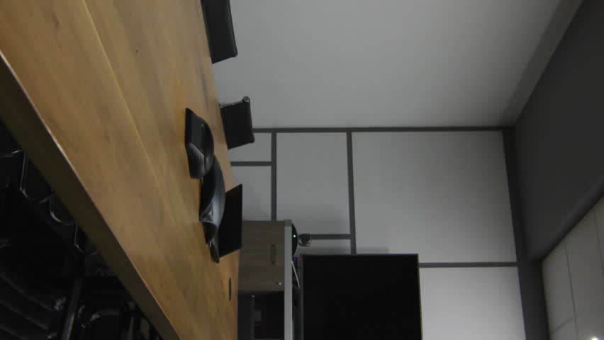 Animation of multiple digital icons against empty meeting room at office. Computer interface and business technology concept - Powered by Shutterstock - Get 15% off with code: PIKWIZARD15