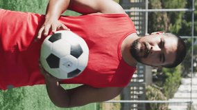 Animation of social media icons over male soccer player with soccer ball on sports field. Social media networking and sports fitness concept - Powered by Shutterstock - Get 15% off with code: PIKWIZARD15