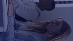 Animation of binary coding data processing over diverse business people in office. Global finance, business, connections, computing and data processing concept digitally generated video. - Powered by Shutterstock - Get 15% off with code: PIKWIZARD15