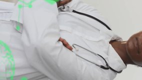 Animation of green medical data processing over african american female doctor smiling at hospital. Medical services, healthcare, digital interface and communication, digitally generated video. - Powered by Shutterstock - Get 15% off with code: PIKWIZARD15