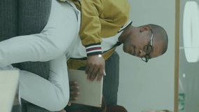 Animation of network of connections with icons over diverse colleagues using tablet in office. Technology, business and digital interface concept digitally generated video. - Powered by Shutterstock - Get 15% off with code: PIKWIZARD15