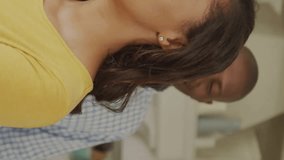 Animation of financial data processing over couple in kitchen. Global finance, business, connections, computing and data processing concept digitally generated video. - Powered by Shutterstock - Get 15% off with code: PIKWIZARD15