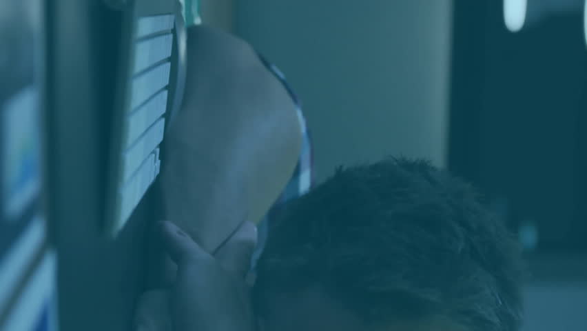 Animation of financial data processing over caucasian businessman using laptop in office. Global finance, business, connections, computing and data processing concept digitally generated video. - Powered by Shutterstock - Get 15% off with code: PIKWIZARD15