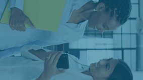 Stock market data animation over smiling businesswomen holding smartphone in office. finance, technology, investment, corporate, success, economy - Powered by Shutterstock - Get 15% off with code: PIKWIZARD15