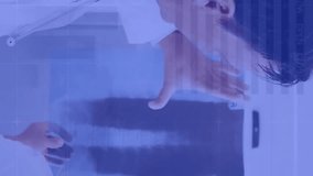 Animation of data processing over caucasian female and male doctor studying x ray. Data, network, digital interface, healthcare, medicine and communication, digitally generated video. - Powered by Shutterstock - Get 15% off with code: PIKWIZARD15