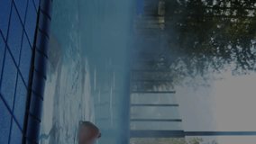 Animation of financial data and graphs over caucasian man in swimming pool. Global business, city life, finance and economy concept digitally generated video. - Powered by Shutterstock - Get 15% off with code: PIKWIZARD15