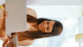 Animation of social media icons over diverse colleagues using electronic devices at office. Social media networking and business technology concept - Powered by Shutterstock - Get 15% off with code: PIKWIZARD15