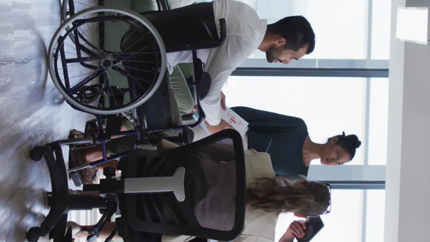 Animation of financial data processing over diverse business people having meeting at office. Global business, finances, communication and digital interface concept digitally generated video. - Powered by Shutterstock - Get 15% off with code: PIKWIZARD15