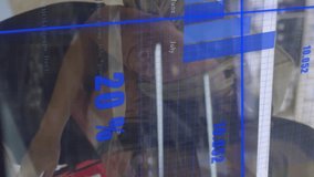 Animation of financial data processing over woman in grocery store. Global finance, business, connections, computing and data processing concept digitally generated video. - Powered by Shutterstock - Get 15% off with code: PIKWIZARD15