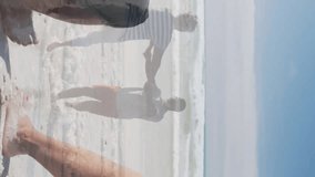 Animation of happy senior couple over senior couple dancing at beach. Retirement, vacation and digital interface concept digitally generated video. - Powered by Shutterstock - Get 15% off with code: PIKWIZARD15