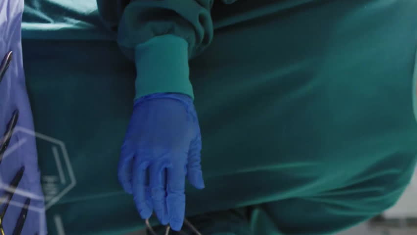 Animation of data processing with chemical formula over diverse surgeons in hospital. Global medicine, healthcare, computing and digital interface concept digitally generated video. - Powered by Shutterstock - Get 15% off with code: PIKWIZARD15