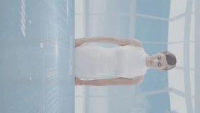 Interacting with digital animation, woman engaging with globe and data in school. Technology, innovation, education, global, interactive, learning - Powered by Shutterstock - Get 15% off with code: PIKWIZARD15