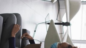 Walking in office, woman surrounded by digital data icons animation. Technology, innovation, business, communication, futuristic, workplace - Powered by Shutterstock - Get 15% off with code: PIKWIZARD15