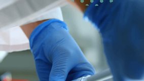 Analyzing liquid sample, scientist with data graphs overlaying in animation lab. Science, research, laboratory, innovation, analysis, technology - Powered by Shutterstock - Get 15% off with code: PIKWIZARD15