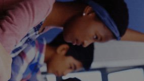 Animation of mathematical equations over schoolchildren learning. global education, technology and connections concept digitally generated video. - Powered by Shutterstock - Get 15% off with code: PIKWIZARD15