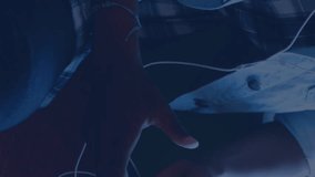 Animation of molecules over african american woman with earphones using smartphone. global technology and digital interface concept digitally generated video. - Powered by Shutterstock - Get 15% off with code: PIKWIZARD15