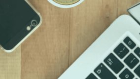 Animation of network of digital icons against smartphone, coffee cup and cup cake on wooden table. Global networking and business technology concept - Powered by Shutterstock - Get 15% off with code: PIKWIZARD15