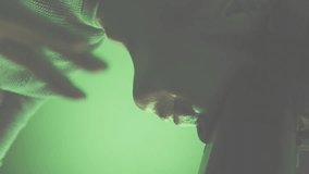 Animation of security padlock icon against asian male engineer wearing vr headset at server room. Cyber security and business data storage technology concept - Powered by Shutterstock - Get 15% off with code: PIKWIZARD15