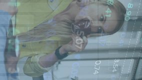 Animation of financial data processing over caucasian couple. Global computing, digital interface and data processing concept digitally generated video. - Powered by Shutterstock - Get 15% off with code: PIKWIZARD15