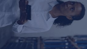 Animation of icons and digital data processing over woman working in warehouse. Global shipping, connections, computing and data processing concept digitally generated video. - Powered by Shutterstock - Get 15% off with code: PIKWIZARD15