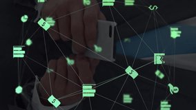 Animation of network of connections with icons over caucasian businessman using smartphone. Global business and digital interface concept digitally generated video. - Powered by Shutterstock - Get 15% off with code: PIKWIZARD15