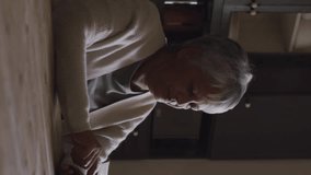 Animation of envelope icons in circles over senior woman scrolling on smartphone at home. Digital composite, multiple exposure, message, shape, retirement and technology concept. - Powered by Shutterstock - Get 15% off with code: PIKWIZARD15