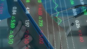 Animation of financial data over midsection of caucasian male doctor making notes. health, medical profession, finance and economy concept digitally generated video. - Powered by Shutterstock - Get 15% off with code: PIKWIZARD15