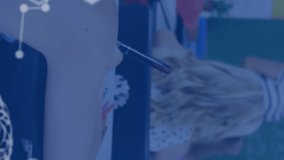 Animation of data processing over diverse schoolchildren learning. Global medicine and digital interface concept digitally generated video - Powered by Shutterstock - Get 15% off with code: PIKWIZARD15