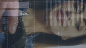 Animation of financial data and graphs over happy caucasian woman using payment terminal. Finance, economy, communication and technology concept digitally generated video. - Powered by Shutterstock - Get 15% off with code: PIKWIZARD15